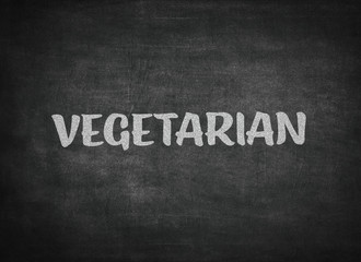 Obraz premium vegetarian concept word on a blackboard background