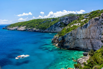 Fototapeta na wymiar View of beautiful cliff and blue sea near Skinari cape on Zakynthos island. Greece