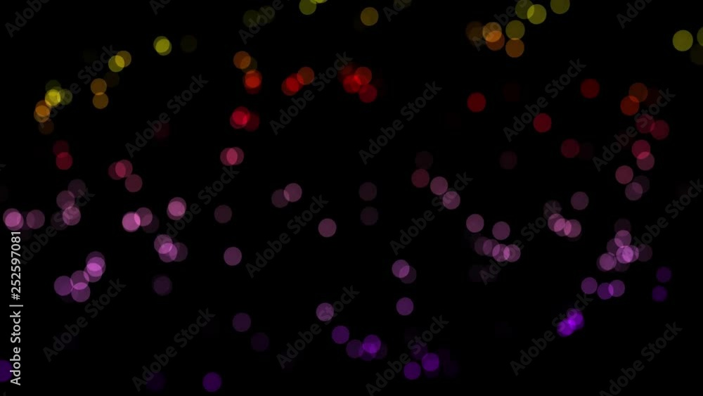 Poster glittering colorful circles, shiny particles shimmering on black background. blur small dots blinkin