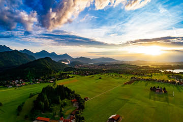Panorama from the air sunset Forggensee and Schwangau, Germany, Bavaria