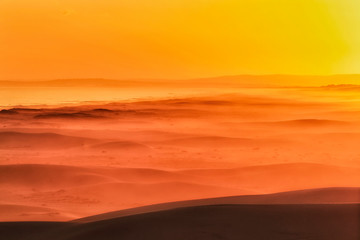 Obraz na płótnie Canvas Dunes Beach tele orange sun