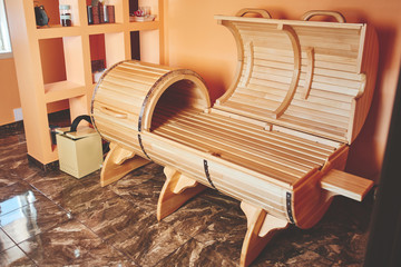 Wooden phytobox,  horizontal sauna in the stylish interior of the spa and wellness center