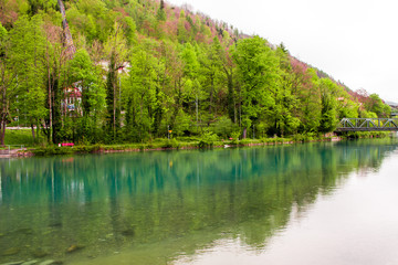 Wonderful reflection on the Lake Thun. Landscape in Interlaken, Switzerland