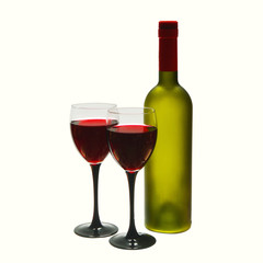 Two glasses of red wine and a green bottle on a white background.