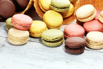 Sweet and colourful french macaroons or macaron on white background