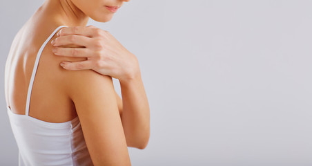 Fototapeta premium Pain, injury in the shoulder. 