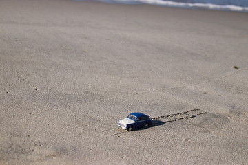 Toy car on the coast.