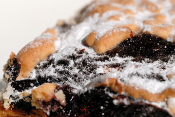 Freshly baked sweet powder cake closeup. Shallow depth of field