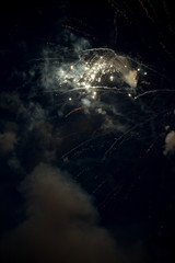 White Firework exploding in the sky for anniversary. Light show in the sky. Festive colorful show in the sky