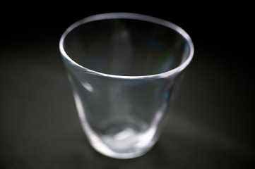 empty glass on black background