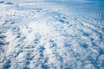 Beautiful clouds, view from airplane window, background