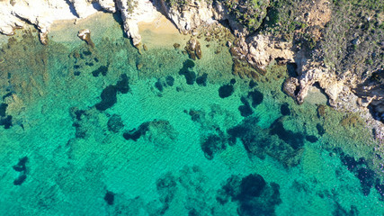 Fototapeta na wymiar Aerial drone photo of beautiful sandy beach with deep turquoise sea of Vagia in island of Serifos at spring, Cyclades, Greece