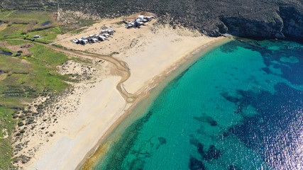 Aerial drone photo of beautiful sandy beach with deep turquoise sea of Vagia in island of Serifos at spring, Cyclades, Greece
