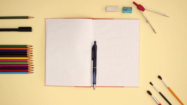 School Supplies apear on yellow background - Stop motion animation