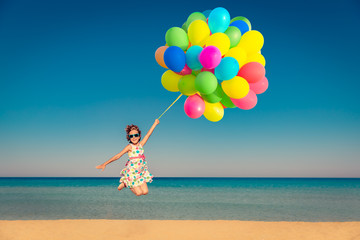 Child enjoys a summer vacation at the sea