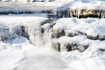 Fototapeta na wymiar Frozen streams of water