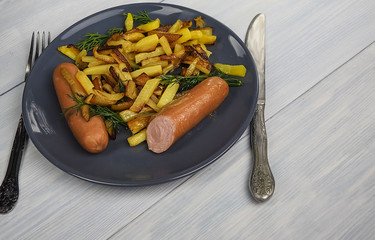 fried potatoes with sausage in a plate