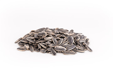 Sunflower seeds isolated on white background closeup