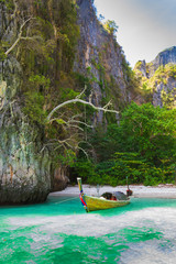 Boats at sea against the rocks in Thailand