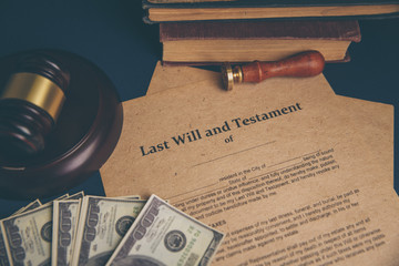 Notary's public pen and stamp on testament and last will. Notary public tools