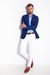 attractive man in smartcasual clothes with arms crossed