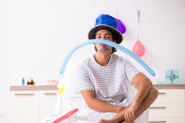 Young man celebrating his birthday in hospital