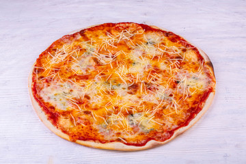 Pizza with cheeses of four types and tomato sauce