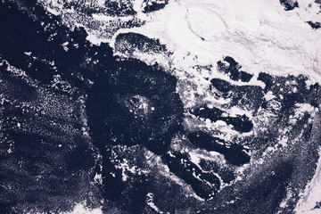 cooking baking. patterns of flour on a black background. rolling pin, flour and hands. cooking dough