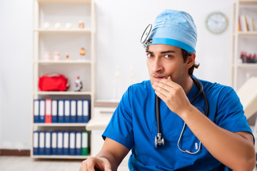 Mad doctor working in the clinic 