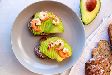 Healthy sandwiches with avocado and shrimp