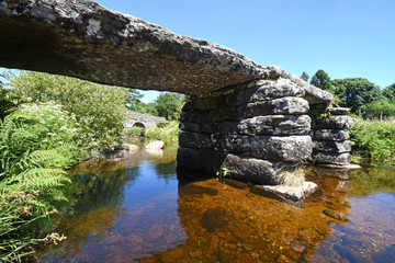Ancient stone Clapper Bridge, Dartmoor, England.