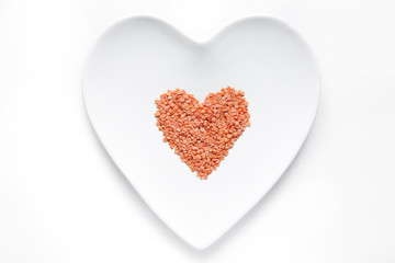 Persian Lentils lie in the shape of a heart on a white plate