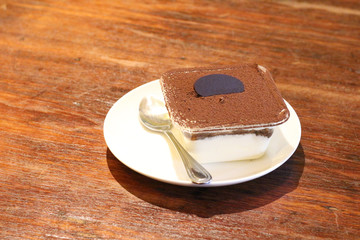 Delicious chocolate cakes on table
