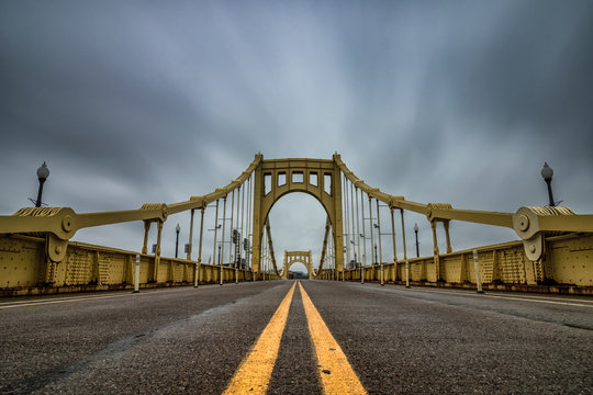 Yellow Suspension Bridge In Pittsburgh Pennsylvania. 