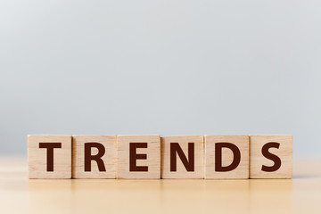The word TREND on wooden cube block. This year's trend concept