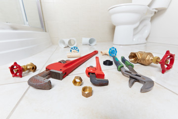 Plumbing tools in the bathroom .
