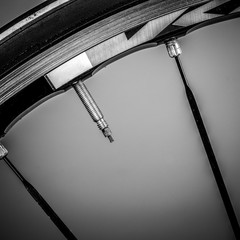 Fragment of a frame and parts of a road bike.