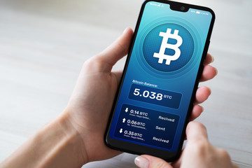 Bitcoin wallet interface on smartphone screen. Cryptocurrency payments and blockchain technology