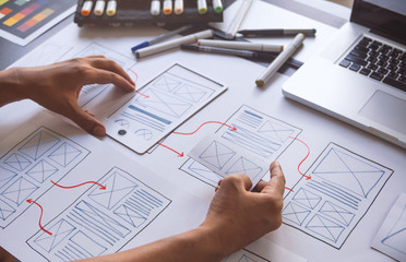 ux Graphic designer creative  sketch planning application process development prototype wireframe for web mobile phone . User experience concept. - obrazy, fototapety, plakaty