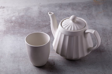 Teapot creamer, Cup and saucer on Cement Board