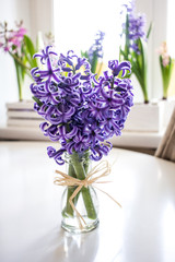 Fototapeta na wymiar bouquet of flowers hyacinths in a vase