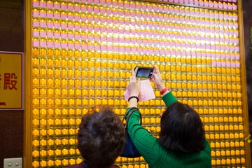 Chinese traditional religious beliefs, devout believers lighting, blessing yellow light