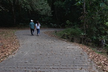 young woman riding bicycle in the park