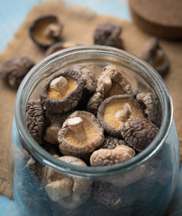 Dried shiitake mushroom on a wooden table