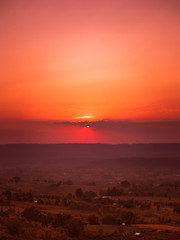 Travel and landscape in summer concept from vertical view of beautiful sky with sunset on layer of mountain and cloudy background