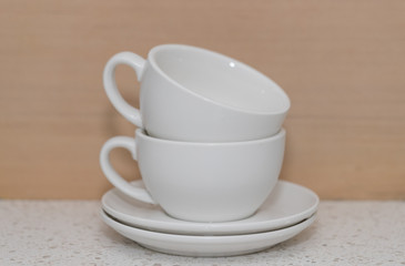 Fototapeta na wymiar White coffee cup on the table - - Image