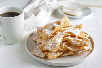 Faworki, Chrusty, Angel Wings - traditional Polish pastries served during Carnival Fat Thursday, just befor Lent. - obrazy, fototapety, plakaty