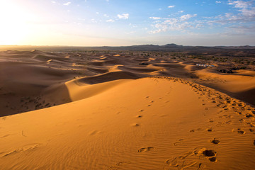 The beauty of the sand dunes in the Sahara Desert in Morocco.
