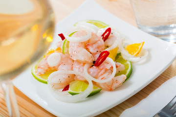 Ceviche with shrimps, lime, orange