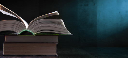 Composition with open book on the table